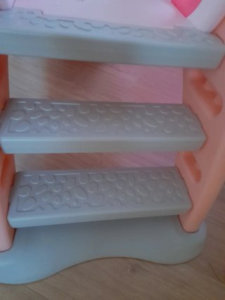 Tobogán infantil rosa y blanco