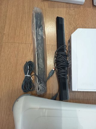 Nintendo Wii + Accesorios y Juegos