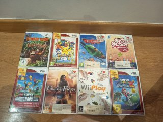Nintendo Wii + Accesorios y Juegos