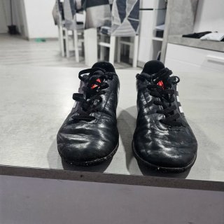 Botas de fútbol multitacos Adidas negras
