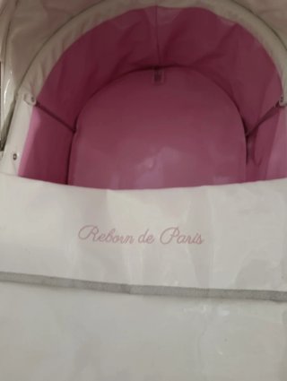 Carrito de muñecas blanco y rosa