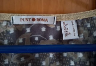 Blusa Punt Roma de flores con plumeti