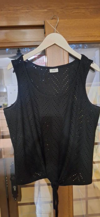 Blusa anudada negra talla única