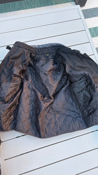 Mono de moto Speed Factory negro y plateado