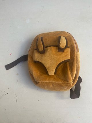 Mochila infantil peluche porta muñecas