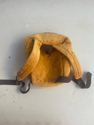 Mochila infantil peluche porta muñecas