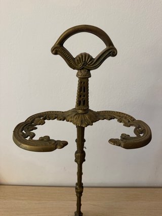 Paragüero antiguo de bronce