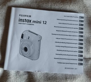 Cámara Fujifilm Instax Mini 12 + funda + álbum