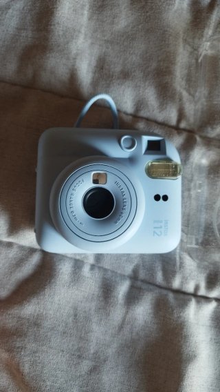 Cámara Fujifilm Instax Mini 12 + funda + álbum