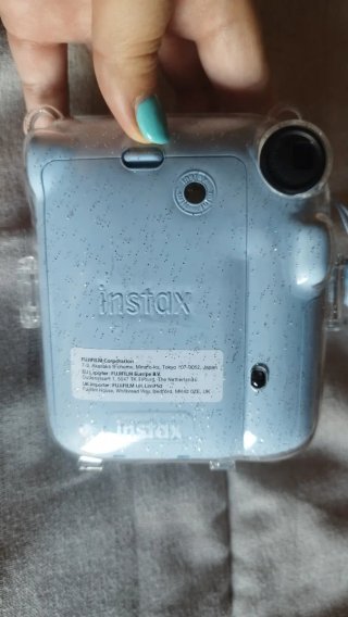 Cámara Fujifilm Instax Mini 12 + funda + álbum