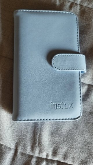 Cámara Fujifilm Instax Mini 12 + funda + álbum