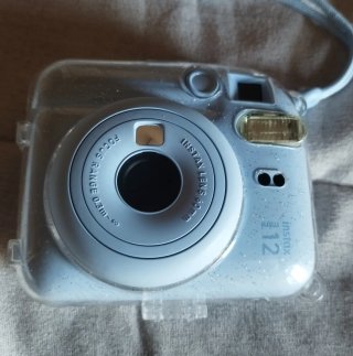 Cámara Fujifilm Instax Mini 12 + funda + álbum