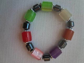 Lotto di 7 braccialetti vintage in quarzo ed ematite