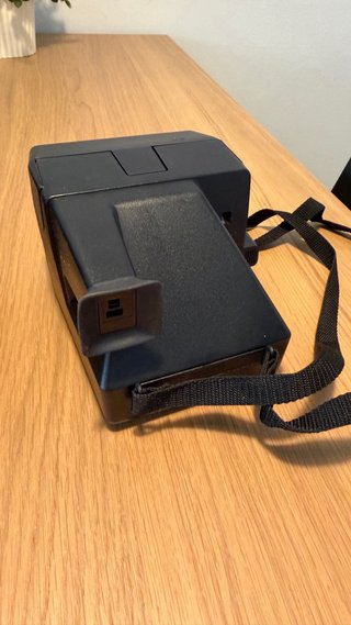 Polaroid Supercolor 670AF con funda
