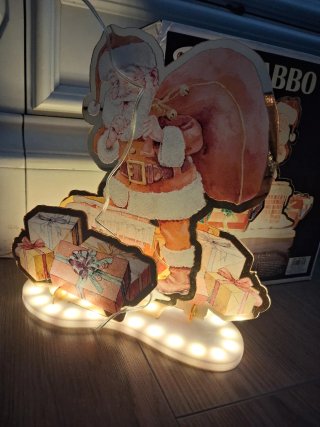 Decorazione luminosa Babbo Natale con regali