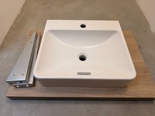 Lavabo de cerámica con encimera y soportes