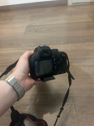 Cámara Canon + Funda + Trípode