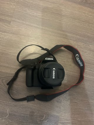 Cámara Canon + Funda + Trípode