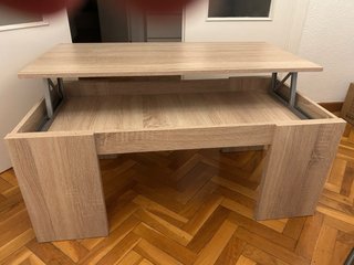 Mesa de centro elevable.