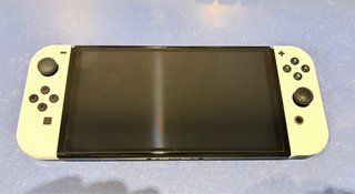 Nintendo Switch OLED con accessori e giochi