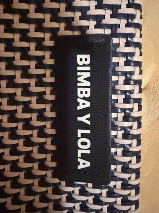 Bolso clutch trenzado BIMBA Y LOLA original · Como