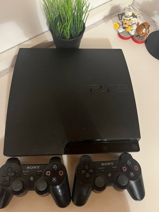 Playstation 3 Slim Negra mas dos mandos +cable.