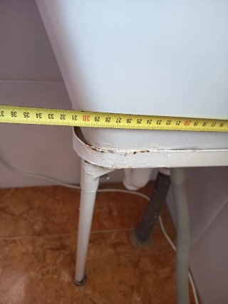 Pila de lavar con patas