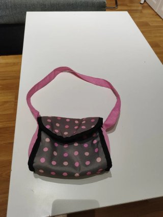 Carrito de muñecas rosa y gris