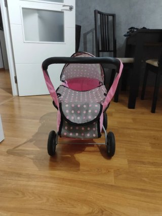 Carrito de muñecas rosa y gris