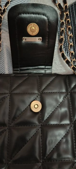 Bolso negro mujer con cadena y lazo