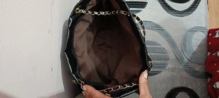 Bolso negro mujer con cadena y lazo