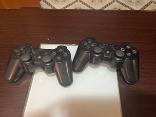 PS3 Super Slim 500GB+ 2 Mandos + 8 Juegos y Cables