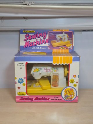 Máquina de coser infantil vintage