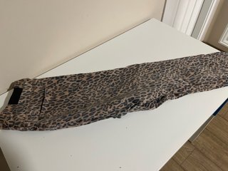 Pantalones H&M Animal Print Talla M