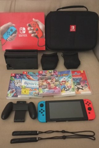 Nintendo Switch + 5 Juegos + Maletín