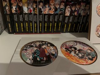 Chapas de la edición especial del Tomo 22