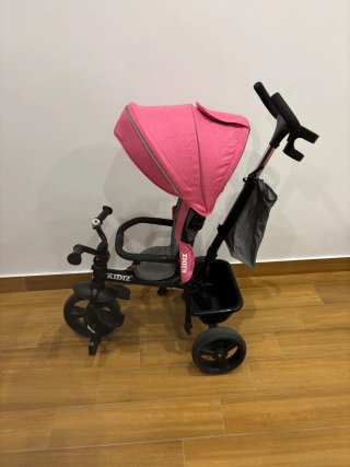 Triciclo para bebé rosa y gris