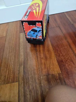 Camión doble remolque coches de carreras