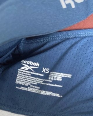 Tops deportivos Reebok negros y azules