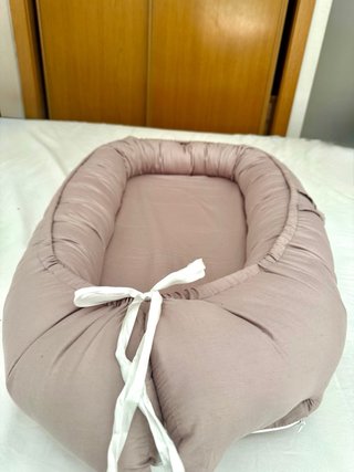Nido reductor bebé rosa palo