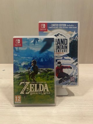 Nintendo Switch OLED + controller HORI + 2 Giochi