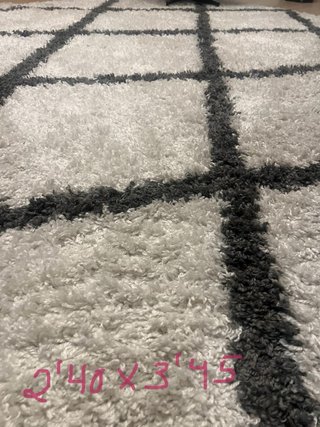 Alfombra blanca diseño geométrico