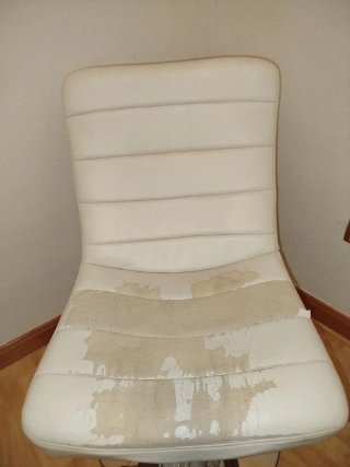 Sillón giratorio con funda floral