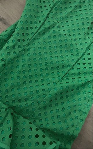 Traje de flamenca verde con volantes