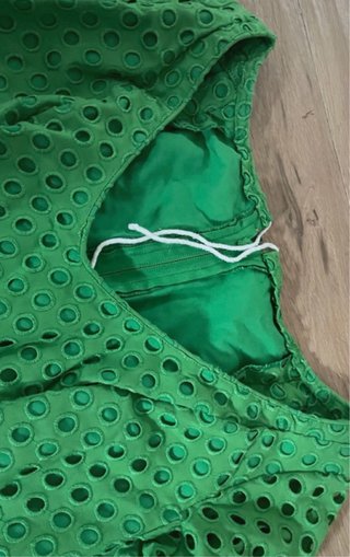 Traje de flamenca verde con volantes