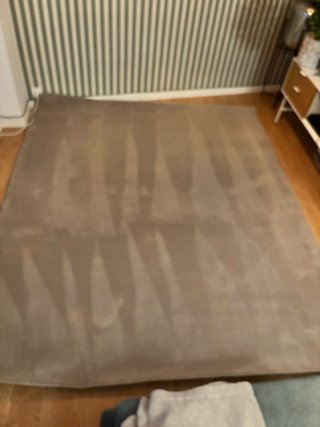 Alfombra gris de tela