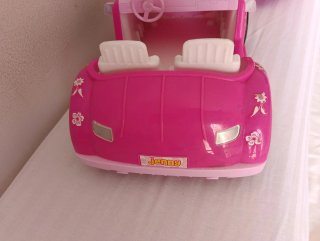 Coche rosa para muñecas