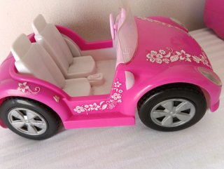 Coche rosa para muñecas