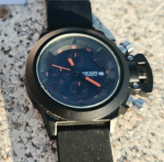 Reloj deportivo Megir negro y naranja