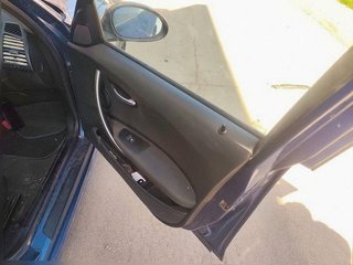 Panel puerta delantera derecha BMW Serie 1...